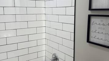 Hair dryer, towels, soap, shampoo
