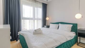 1 غرفة نوم ومكواة/لوح كي وواي فاي وملاءات أسرّة