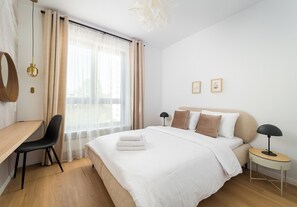 1 slaapkamer, een strijkplank/strijkijzer, wifi, beddengoed