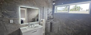 Shower, hair dryer, towels, soap