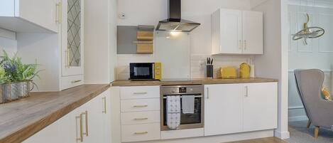 Microwave, oven, toaster, cookware/dishes/utensils