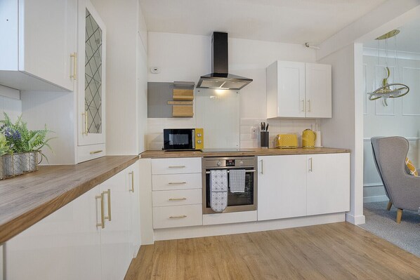 Microwave, oven, toaster, cookware/dishes/utensils