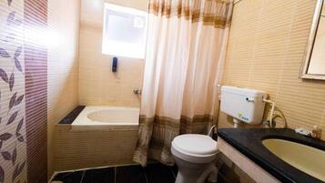 Shower, free toiletries, hair dryer, towels