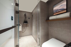 Shower, hair dryer, slippers, towels
