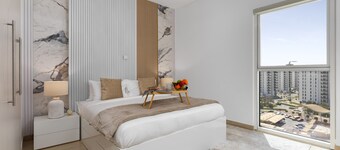 Sleek Yas Getaway w/ Ferrari World & Canal Views