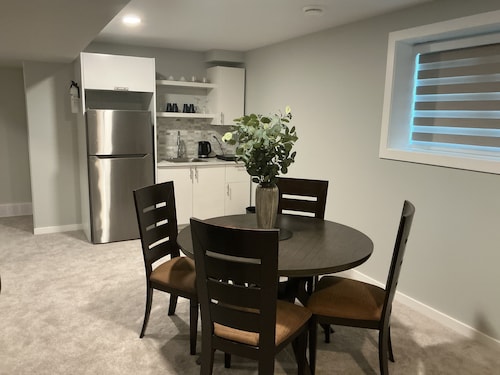 "Modern 2BR Suite with Private Entrance, Workspace, A/C & Parking in Sage Creek"