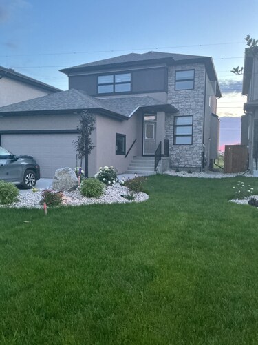 "Modern 2BR Suite with Private Entrance, Workspace, A/C & Parking in Sage Creek"