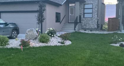 "Modern 2BR Suite with Private Entrance, Workspace, A/C & Parking in Sage Creek"