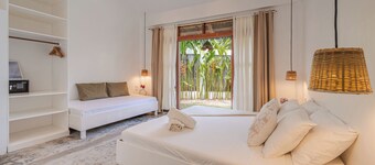 Cozy 2-bd bungalow in GL with generator kitchen &  shared pool