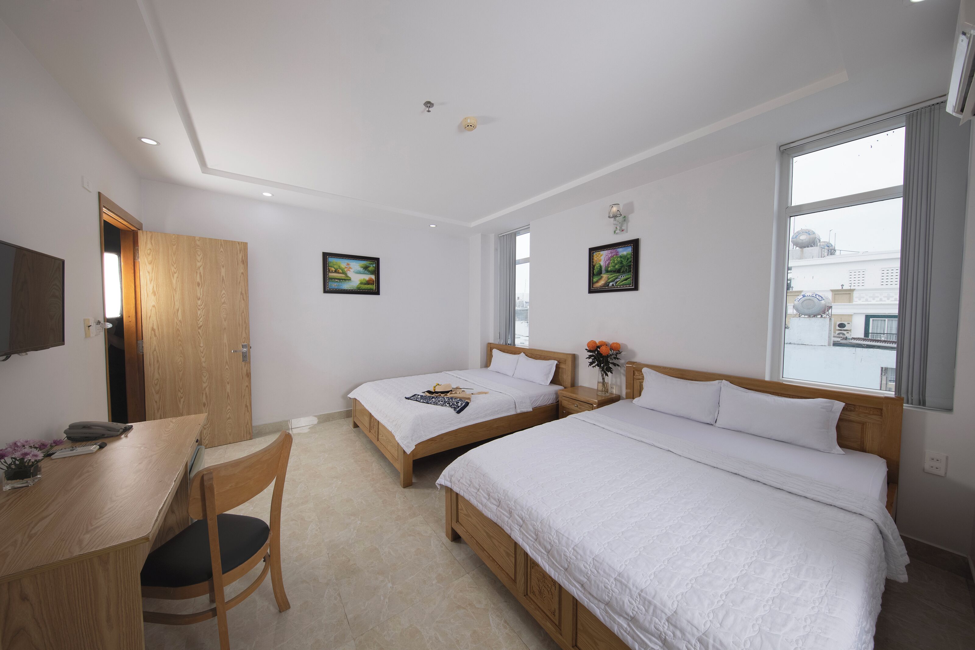 Deluxe-Vierbettzimmer | Schreibtisch, kostenloses WLAN, Bettwäsche