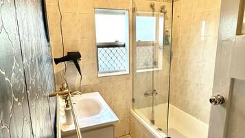 Hair dryer, towels, soap, toilet paper