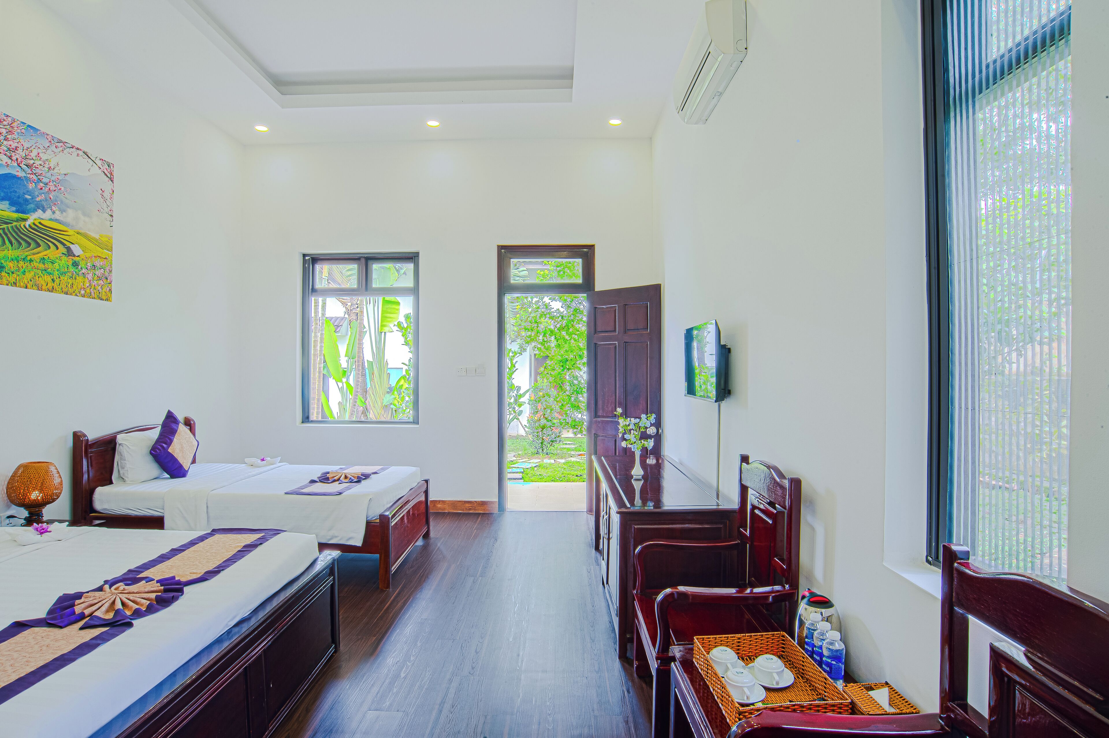 Luksusbungalow (Lotus Island - Triple) | Tallelokero huoneessa, työpöytä, pimennysverhot, äänieristys