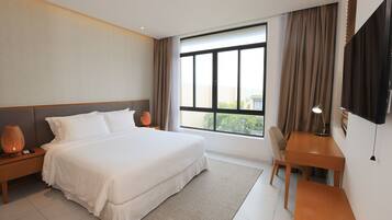 Deluxe kamer | Een bureau, verduisterende gordijnen, gratis wifi, beddengoed