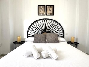 3 habitaciones, tabla de planchar con plancha, internet y ropa de cama 