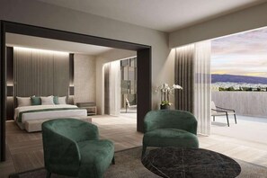 A modern hotel room with a large bed, two green armchairs, a small table, and a balcony with a view. - NJV Athens Plaza (Athens)