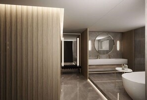 A modern bathroom with a large mirror, a bathtub, and a vanity with a sink. - NJV Athens Plaza (Athens)