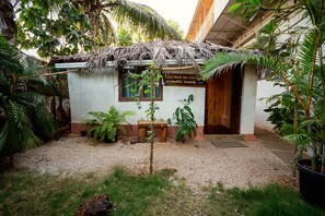 Junior Studio Suite, Garden View | In-room safe, iron/ironing board, free WiFi