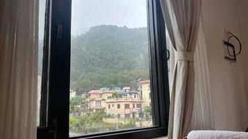 Deluxe Double Room, 1 King Bed, Hill View | Desk, laptop workspace, free WiFi