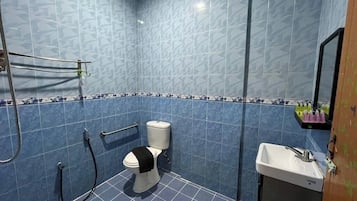 Shower, towels, soap, shampoo