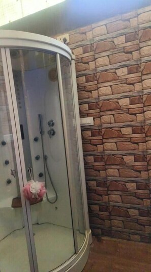 Basic Double Room, City View | Bathroom | Shower, free toiletries, towels, soap