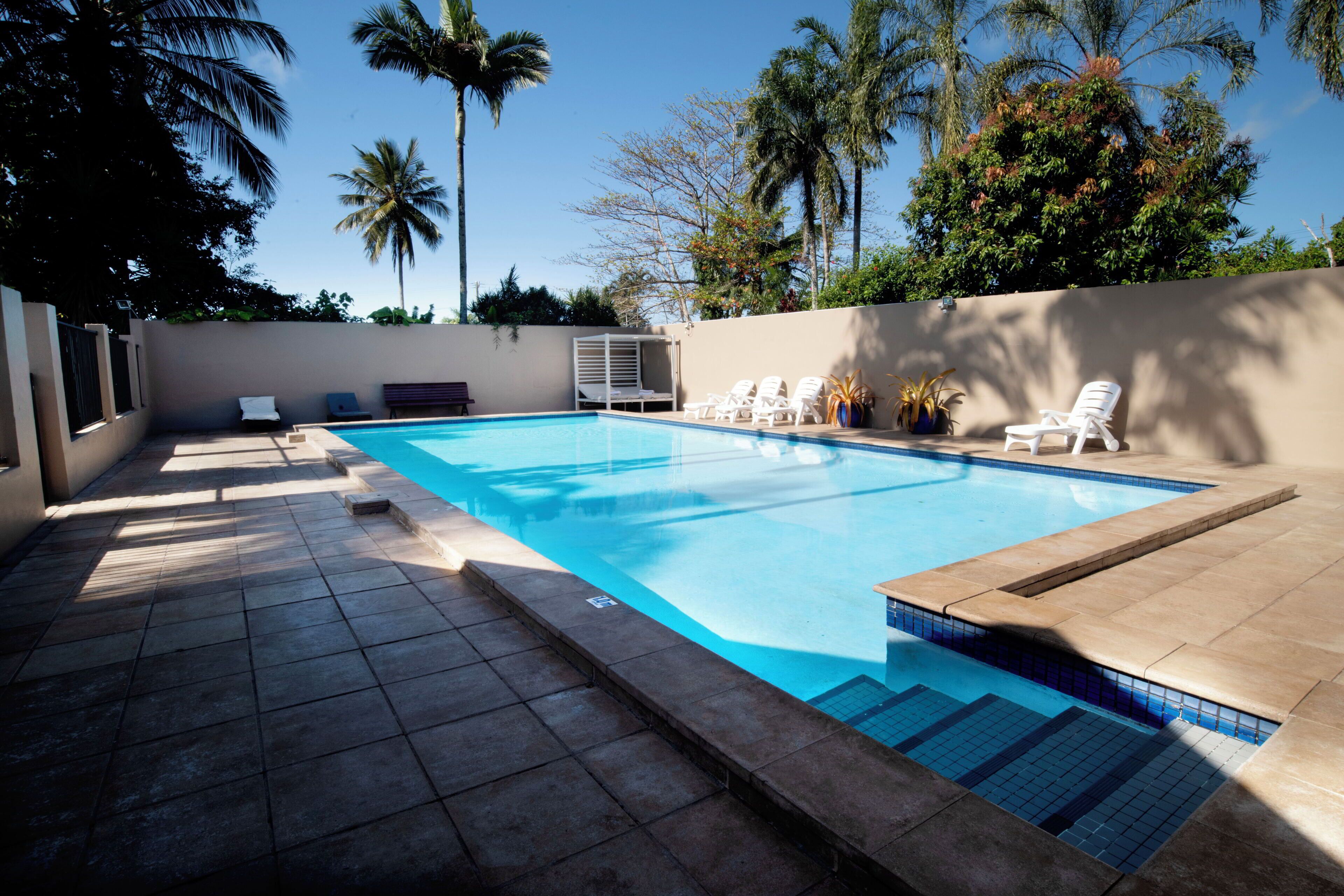 Outdoor pool, open 7:00 AM to 9:00 AM, sun loungers