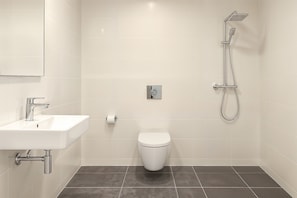 Shower, free toiletries, towels, soap