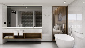 Suite Junior | Salle de bain | Sèche-cheveux, peignoirs, chaussons, serviettes fournies