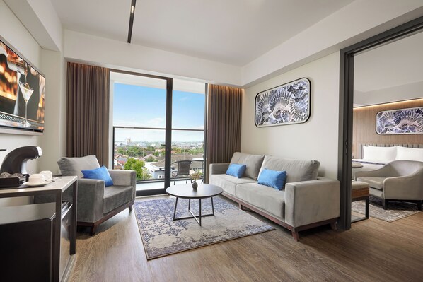 Suite | Minibar y ropa de cama 