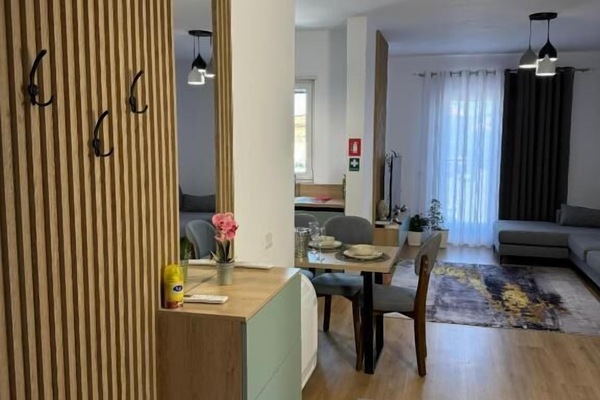 Apartment, Balcony, City View | Living area | Flat-screen TV