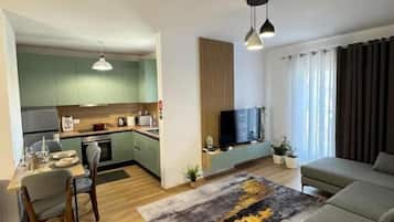 Appartement, balcon, vue ville | Coin séjour