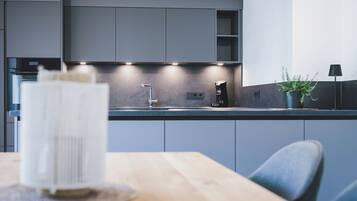 Deluxe Condo, Balcony, Mountain View | In-room dining