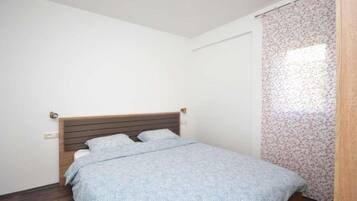 Tabla de planchar con plancha y Internet