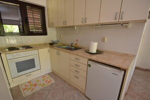 Fridge, oven, stovetop, dining tables - Two Bedroom Apartment (Igalo)