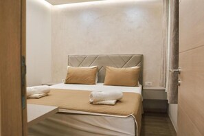 1 habitación, tabla de planchar con plancha y wifi gratis