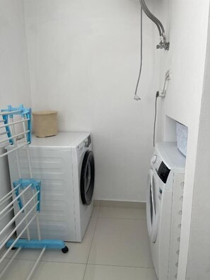 Apartment, Balcony, City View | Laundry