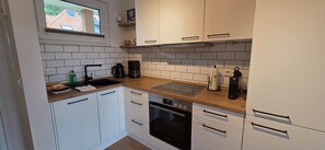 Refrigerador, horno, parrilla de estufa y lavavajillas