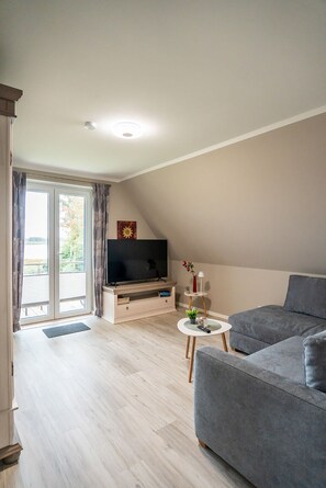 Living area - Modern gallery apartment with balcony view of the Puddeminer Wiek! (Poseritz)