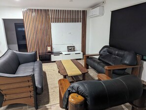 Deluxe Apartment | Living area