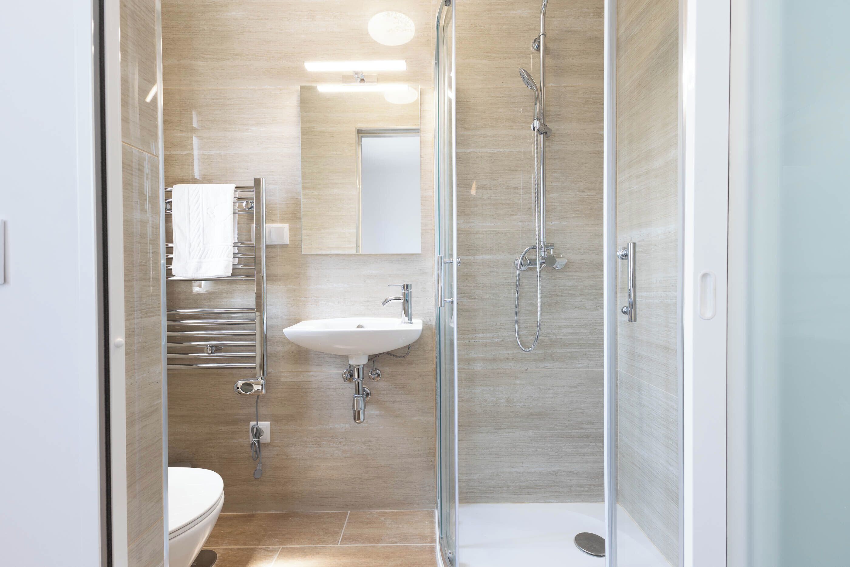 Hair dryer, towels, soap, shampoo