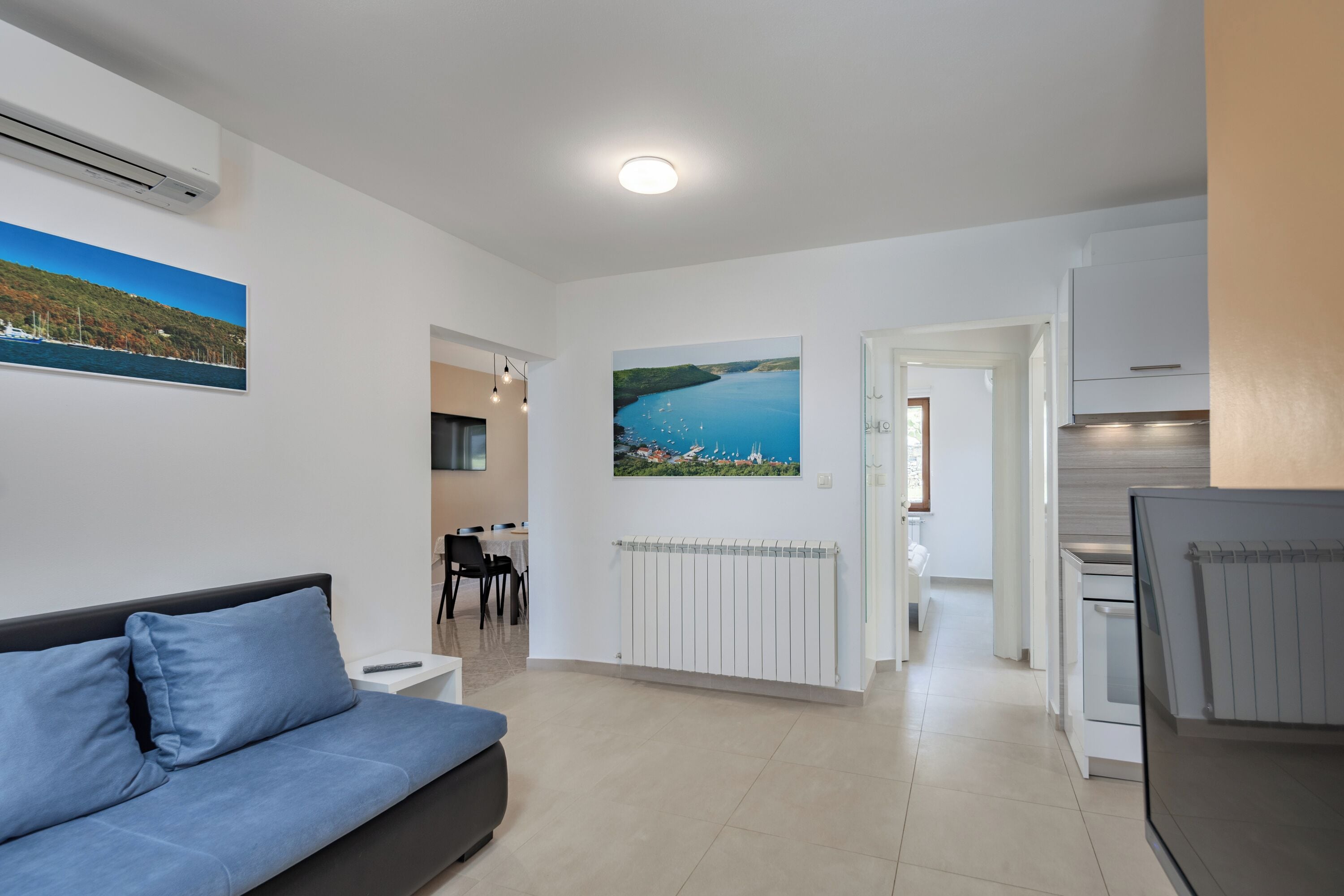 Family House, Multiple Bedrooms (Seaview Pool House Mytilus) | Living area | 21-inch Smart TV with satellite channels