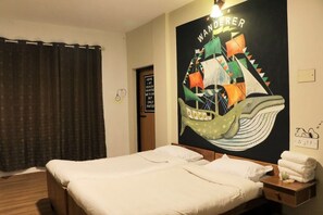 Habitación doble familiar, vista al jardín | Wifi gratis 