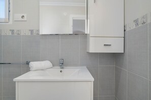 Doccia, asciugacapelli, asciugamani