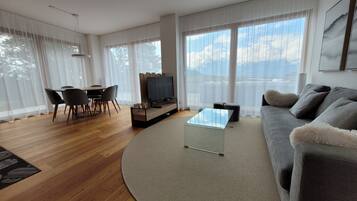 Deluxe Apartment, Mountain View | Living area | Flat-screen TV
