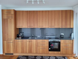 Deluxe Apartment, Mountain View | Private kitchen | Electric kettle, toaster - Laax Alpine Lodge (Laax)