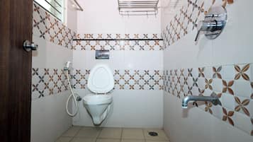 Separate bathtub and shower, towels, soap, shampoo