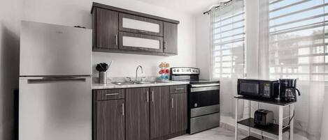 Fridge, microwave, oven, stovetop