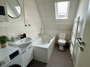Hair dryer, towels, soap, toilet paper