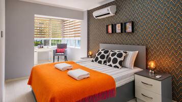 Family Condo, 3 Bedrooms, Kitchen, City View | Desk, laptop workspace, blackout drapes, soundproofing