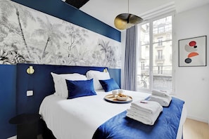 2 chambres, fer et planche à repasser, Wi-Fi, draps fournis