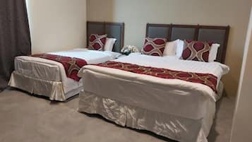 Habitación triple Deluxe | Tabla de planchar con plancha y wifi gratis
